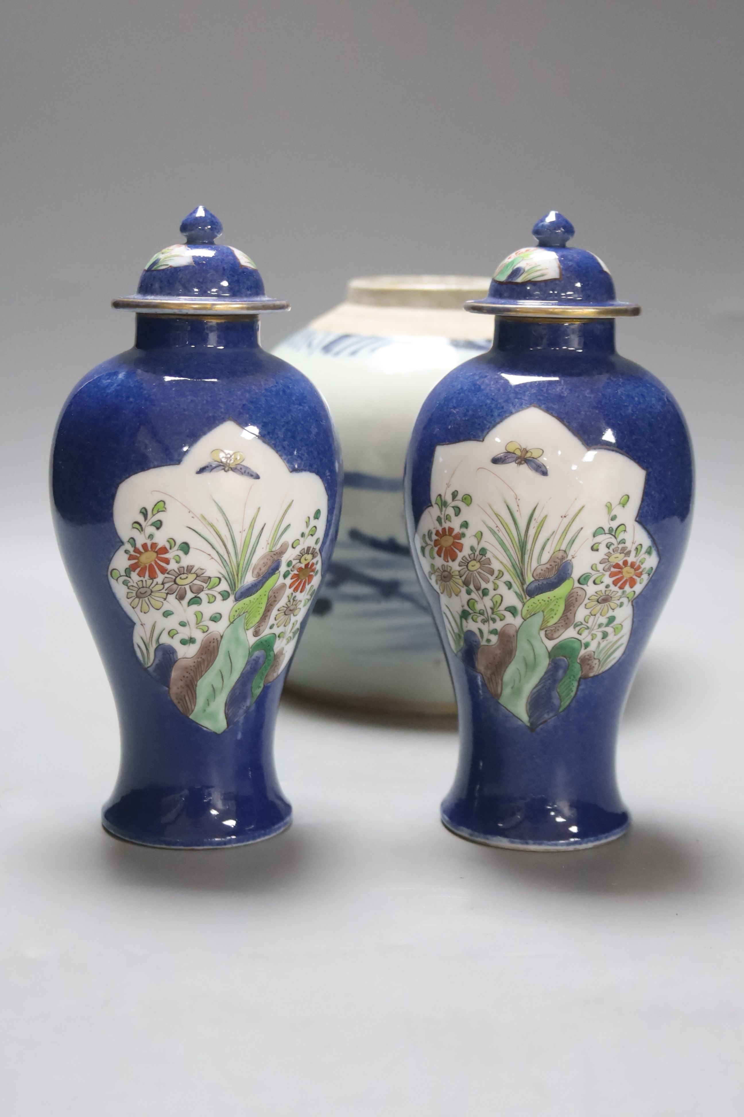 A Chinese jar, a pair of vases and three graduated brush pots, Qing period or later, tallest 18cm